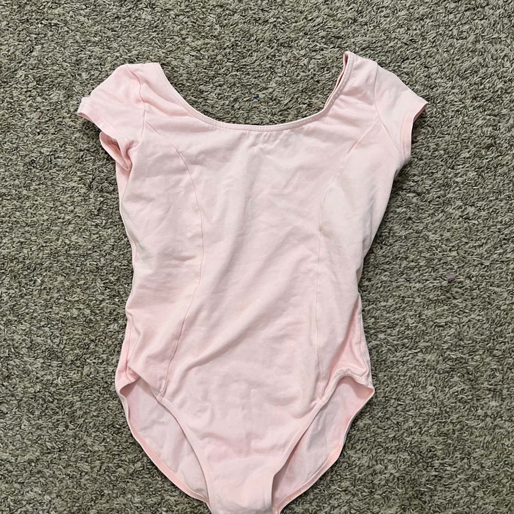 Light pink women’s leotard/bodysuit